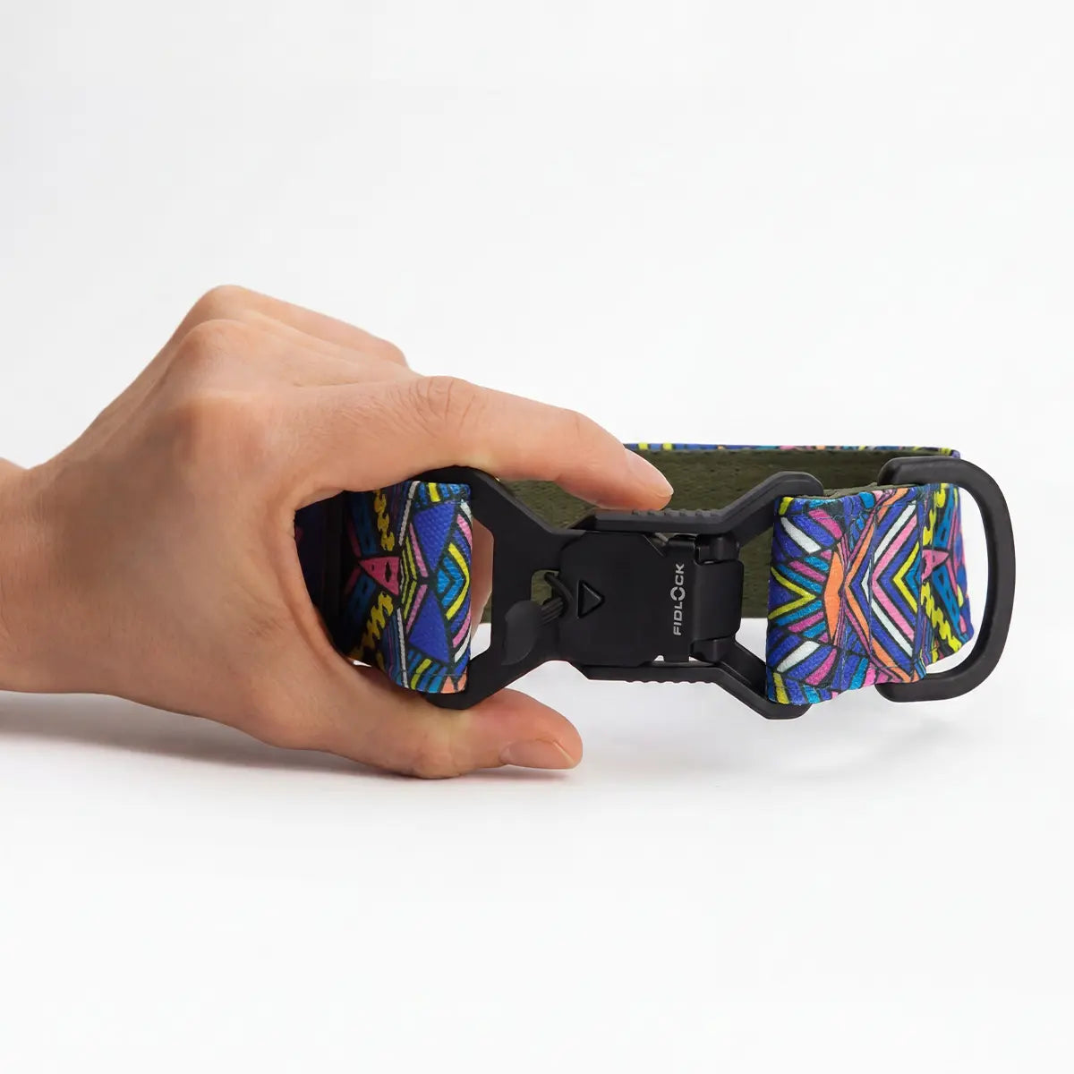 Wide dog collar 4 cm Electric Tribe pattern shown in hand for size reference